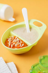 baby feeding bowl and spoon for fruit feeding | silicone baby feeding spoon fruit feeding time | baby feeding products for 6-12 month baby fruits | safe baby feeding bowl spoon set for infants | feeding tools for giving fruits to baby